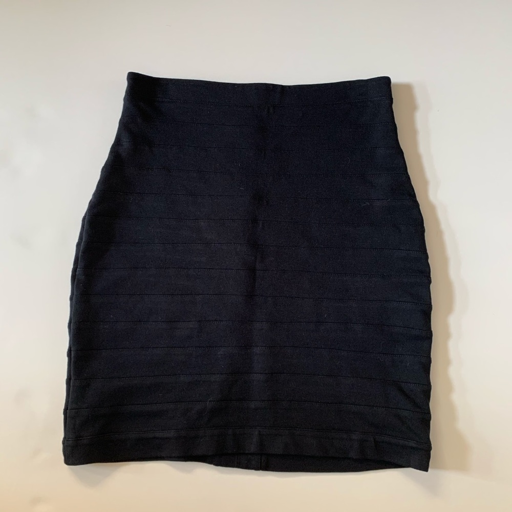 Express black fitted skirt with back zipper.